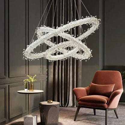 Decorbites crystal flower led chandelier features a crystal-encrusted infinity loop design ideal for dining rooms