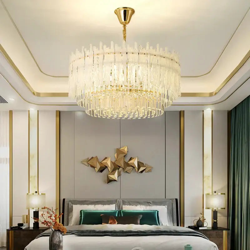A decorbites crystal glaze gold chandelier with cascading clear crystal prisms for luxury dining room ceiling decor