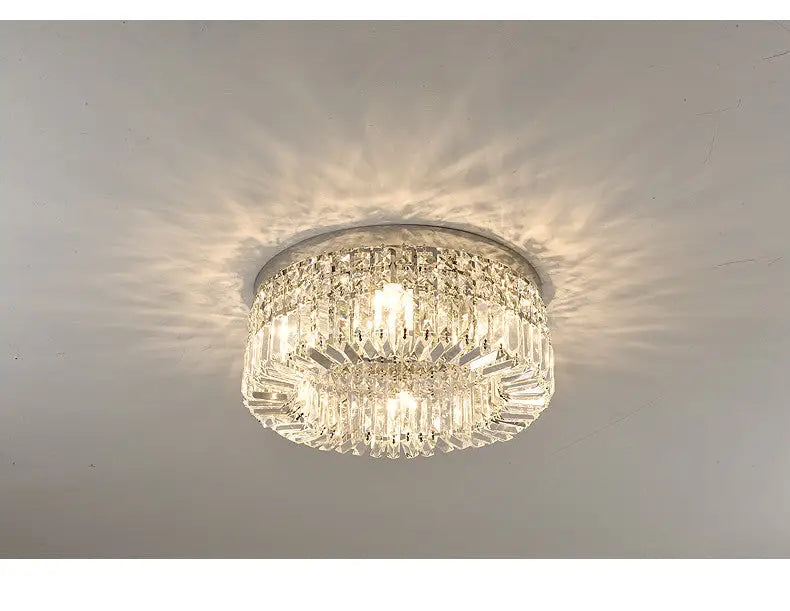 DecorBites™ crystal LED chandelier ceiling light with a clear multi-tiered design and gold metallic ring for dining room