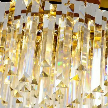 A decorbites crystal led chandelier gold art deco dining room light with faceted rectangular and triangular prisms