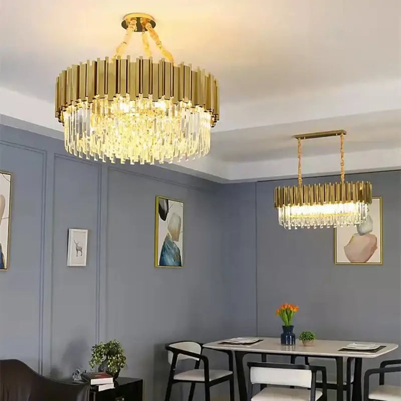 Gold-toned decorbites crystal led chandelier with vertical crystal rods and cascading clear glass prisms for living room