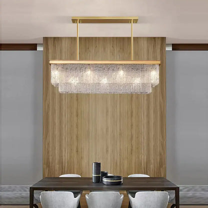 Gold-toned decorbites crystal led chandelier with layered textured glass panels for elegant dining room lighting