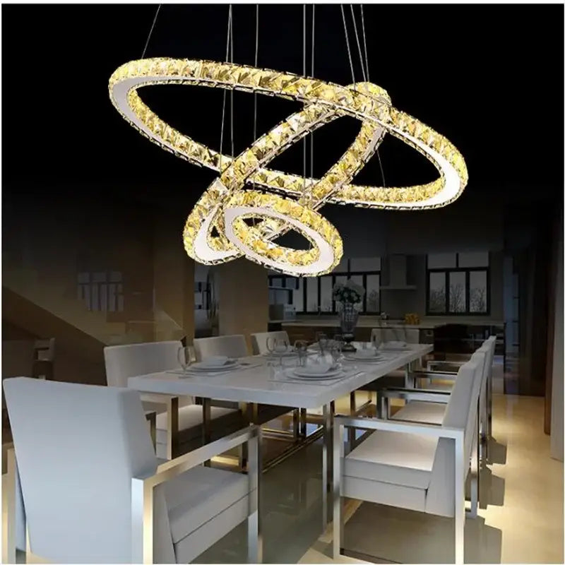 Golden crystal led chandelier with interlocking circular design by decorbites crystal led for modern living rooms