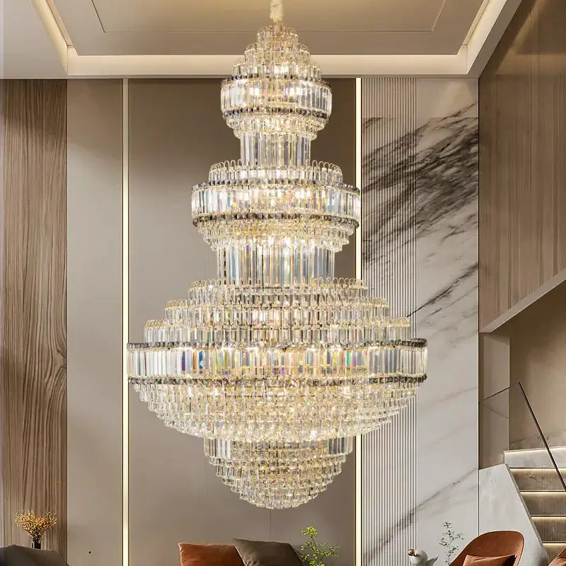 A decorbites crystal villa gold chandelier with cascading clear glass prisms for elegant living room lighting