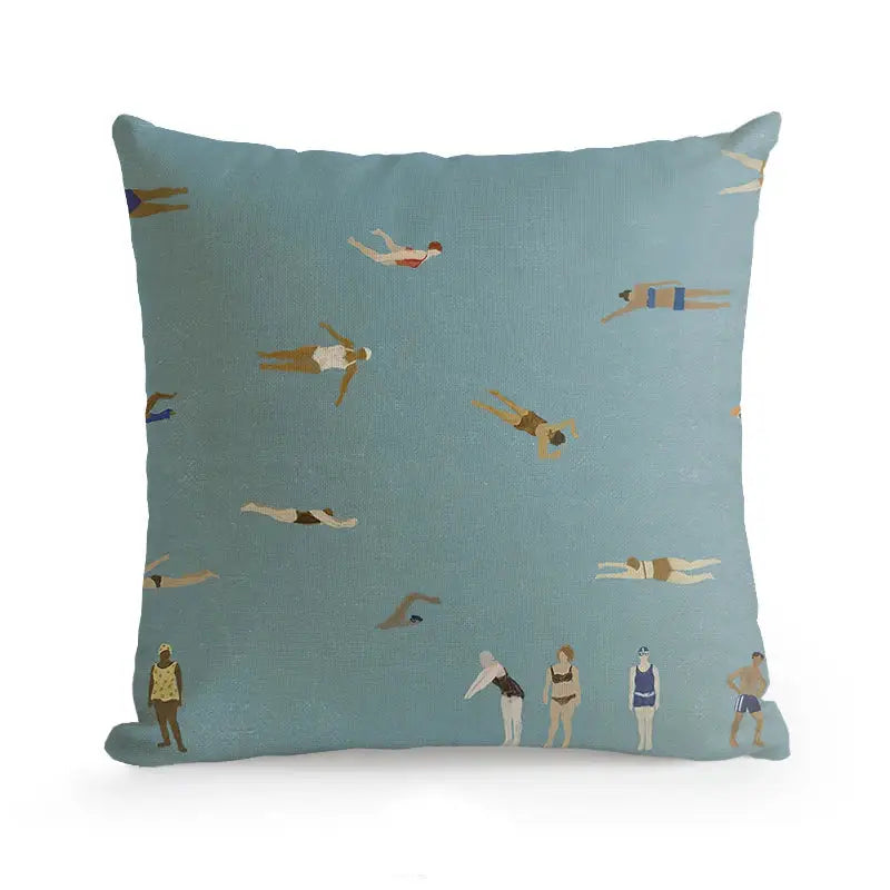 A decorbites cute dog printed designer square cushion with light blue fabric featuring stylized swimmers in swimwear