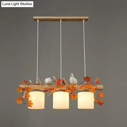 Decorbites™ cylindrical milk glass pendant light with warm shades and resin bird deco for country style restaurants