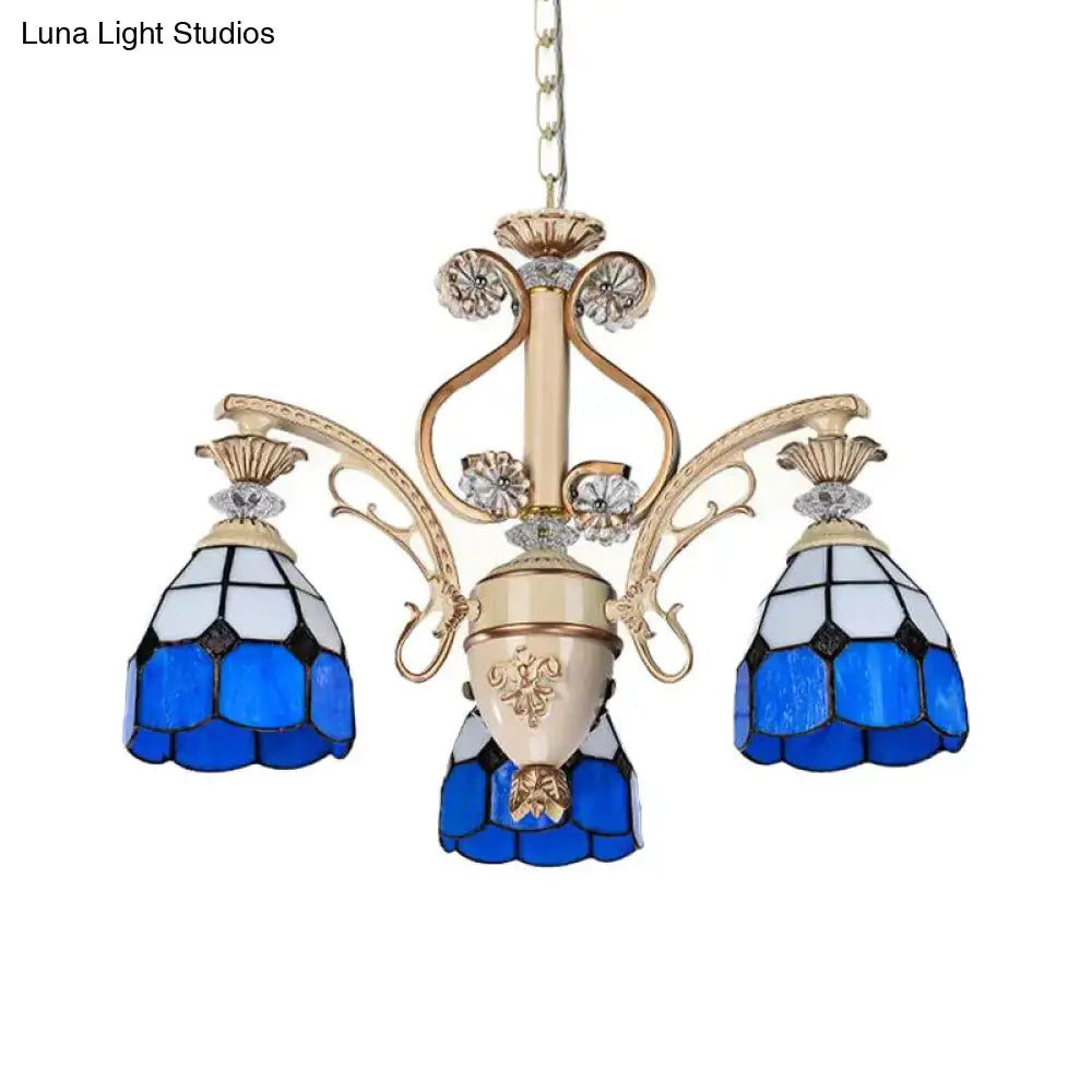 Decorbites dazzling baroque chandelier light fixture in blue and white stained glass with gold metalwork and cut glass pendants