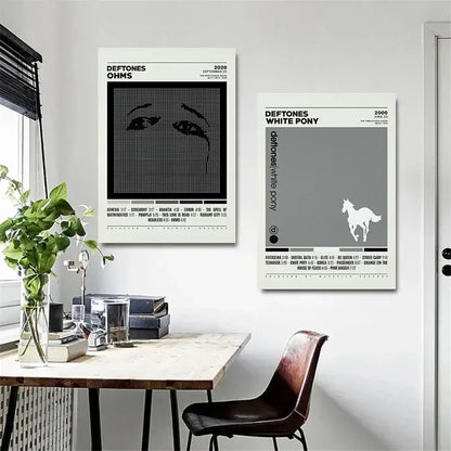 Two minimalist deftones canvas painting prints featuring a black-and-white pixelated eye and white horse silhouette design