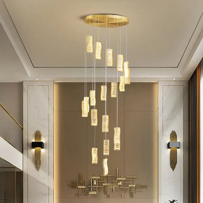 Golden circular chandelier with hanging rectangular crystal pendants from decorbites deluxe crystal spiral slinglights collection