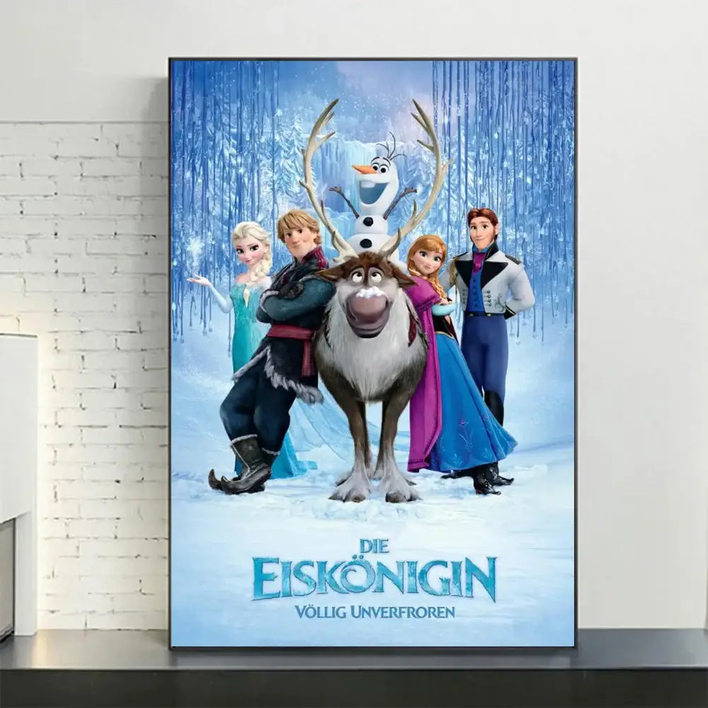 A framed decorbites™ disney frozen anna and elsa canvas art with blue icy background and falling snowflakes