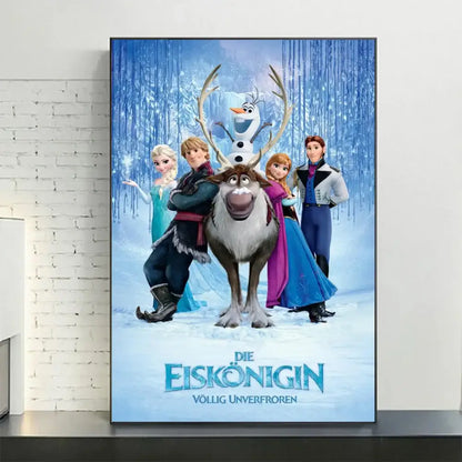 A framed decorbites™ disney frozen anna and elsa canvas art with blue icy background and falling snowflakes