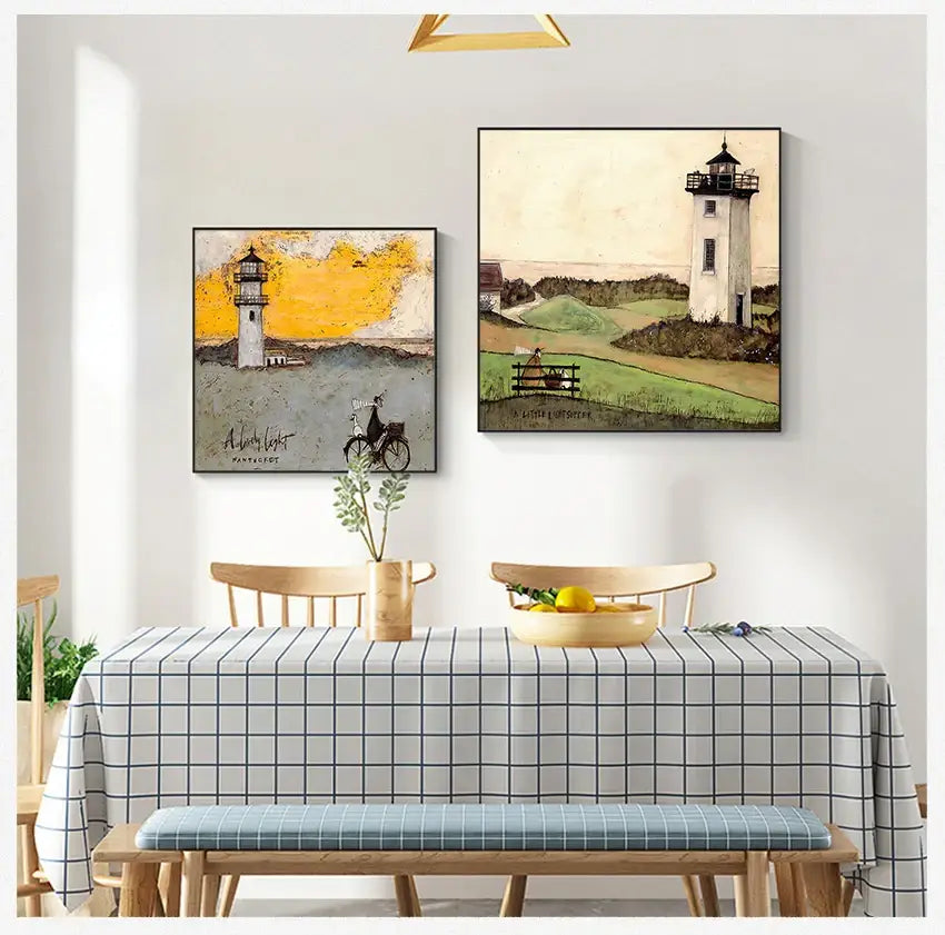 Two framed lighthouse canvas wall art pieces hang above a dining table in the DecorBites™ dog lover nordic collection