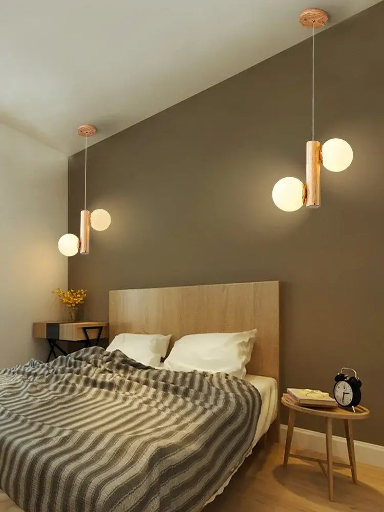 Modern gold bamboo e27 pendant lamp with copper cylindrical bodies and frosted glass globes for dining room lighting