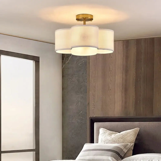 DecorBites™ elegant 4-light gold ceiling fixture with three soft off-white cylindrical shades modern ceiling light