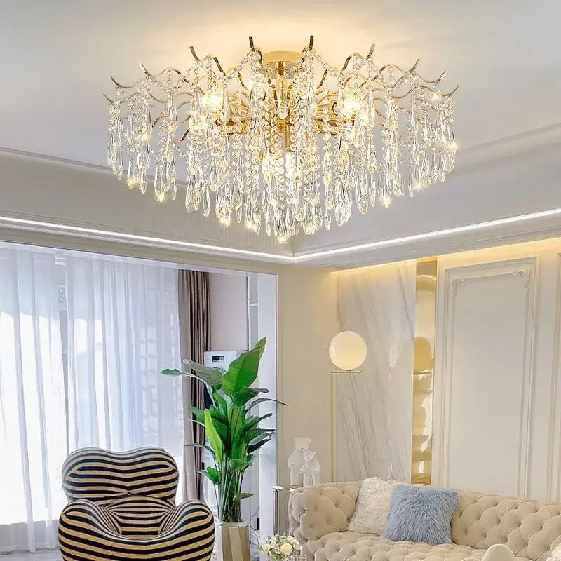 A decorbites elegant crystal gold branching chandelier with cascading crystal droplets for dining room lighting