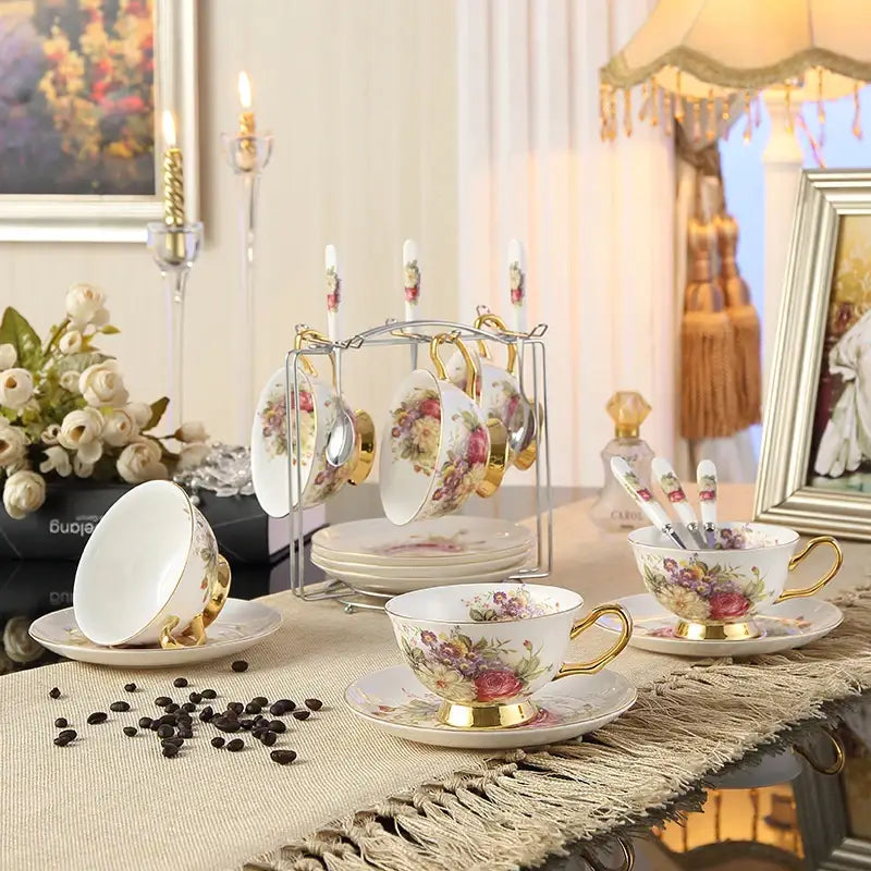DecorBites™ elegant floral bone china tea cup set 200ml with gold accents on matching porcelain saucers and spoon
