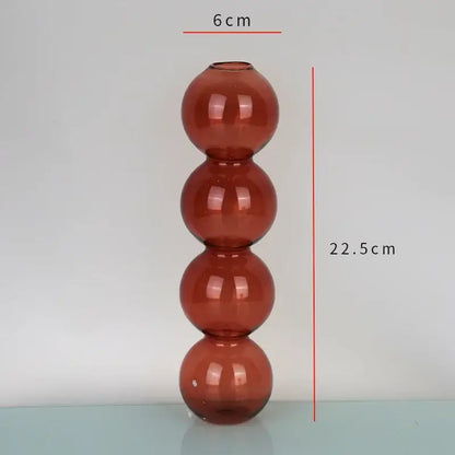 Tall amber glass vase with four stacked spherical sections by decorbites, an elegant glass vase for home decor accents