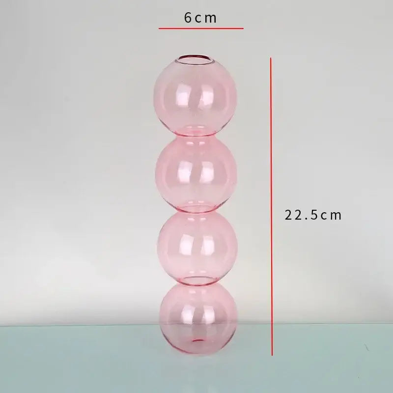 Decorbites™ elegant glass vase home decor accent featuring a translucent pink glass vase with four stacked spheres