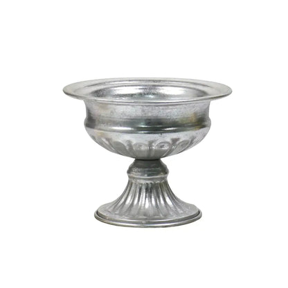 Silver metallic metal flower vase with fluted base and embossed floral pattern for elegant decorbites candle holders