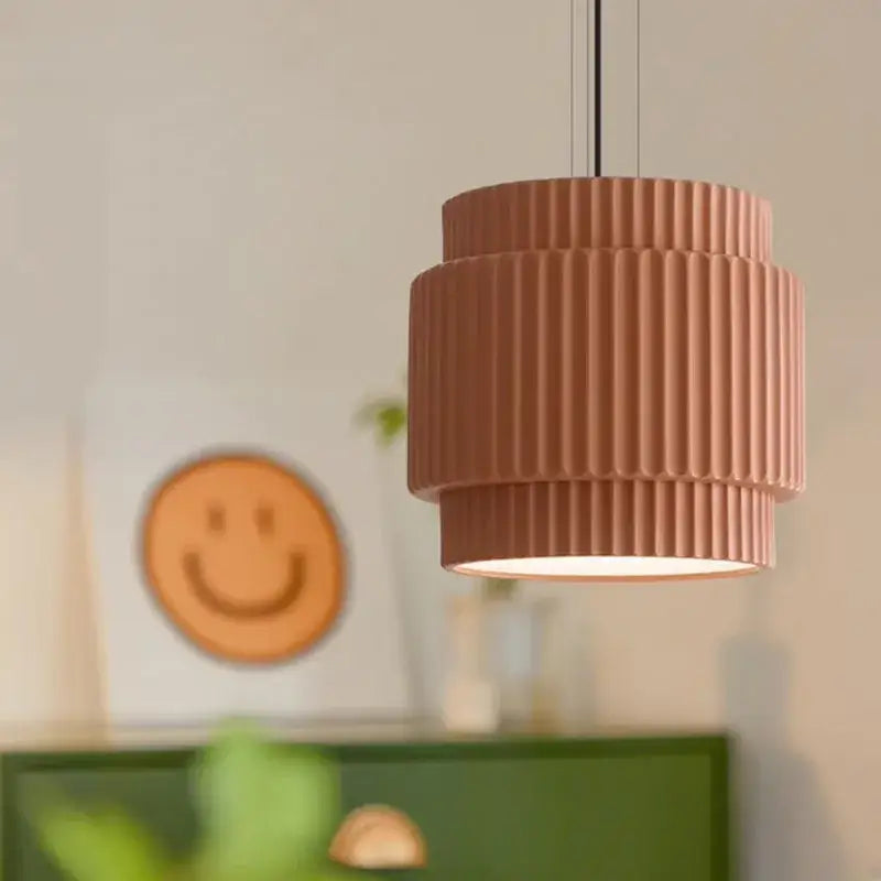Decorbites elegant resin tiered pendant light with matte terracotta finish and vertical ridged texture for dining room
