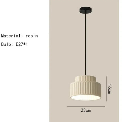 Cream-colored decorbites elegant resin pendant light with ribbed tiered design and black hanging cord for dining room