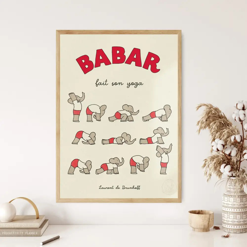 A framed cream background poster of babar the elephant in red and white yoga poses for kids room elephant family yoga decor