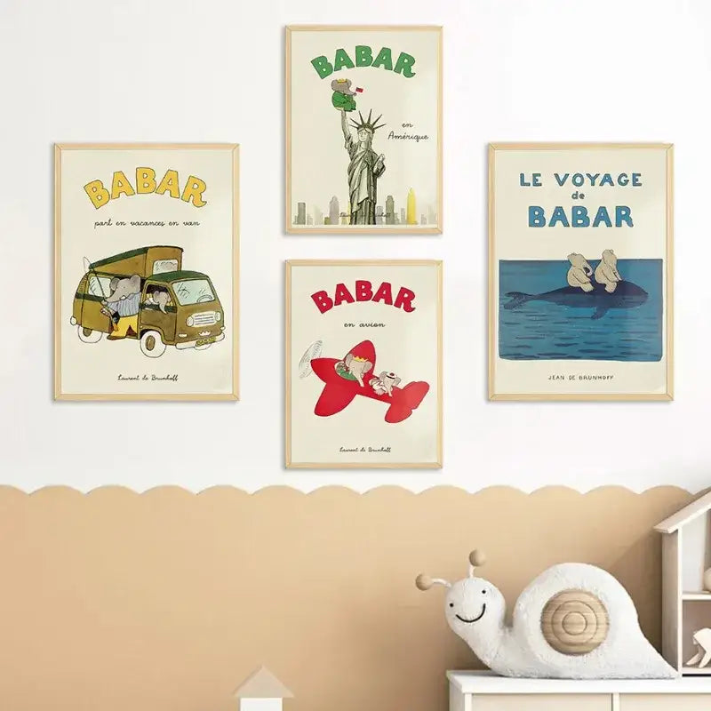 Set of four framed DecorBites™ elephant family yoga posters with vintage illustrations for kids room decor in light wood frames