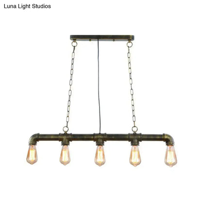 Industrial-style elongated pipe island pendant light with dark brass pipe frame and five exposed edison bulbs for dining room