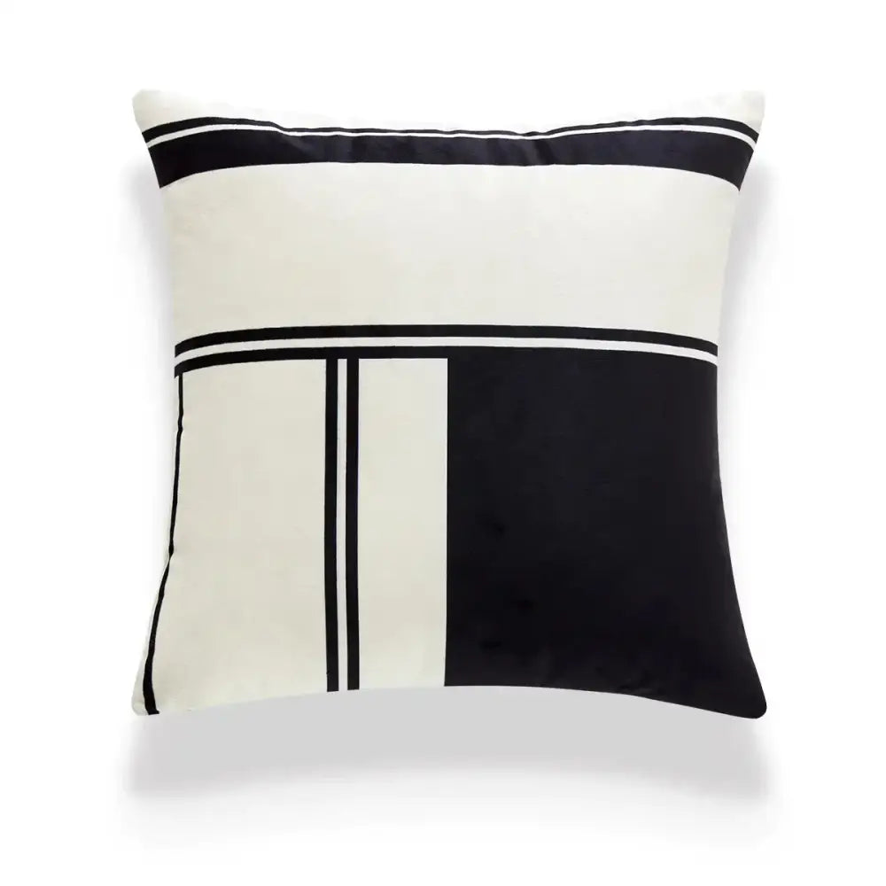 A decorbites embroidered black and white cushion cover with bold geometric stripes on soft fabric for living room use