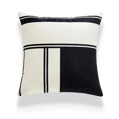 A decorbites embroidered black and white cushion cover with bold geometric stripes on soft fabric for living room use