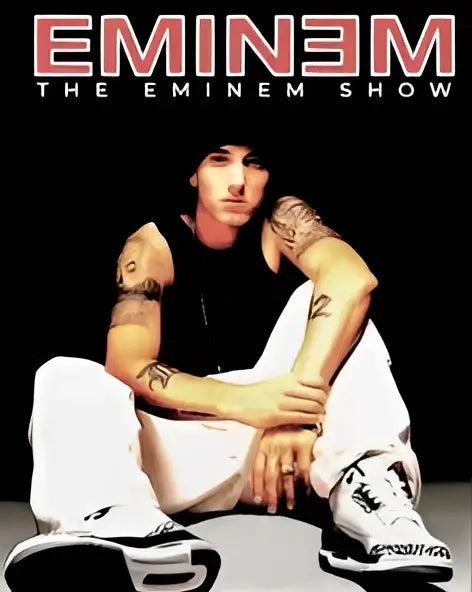 Eminem sits cross-legged in white pants and black sneakers in decorbites music star wall art poster print