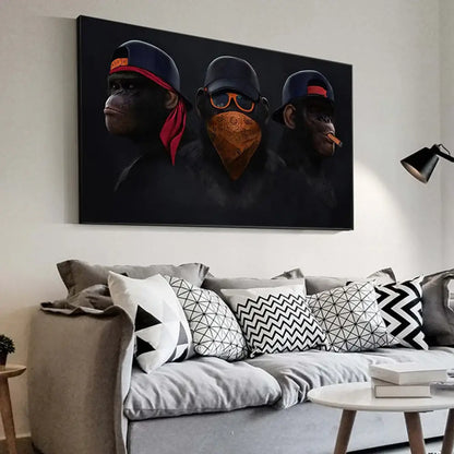 Black canvas monkey wall art featuring three hip-hop styled monkeys wearing caps and bandanas with one smoking a cigar