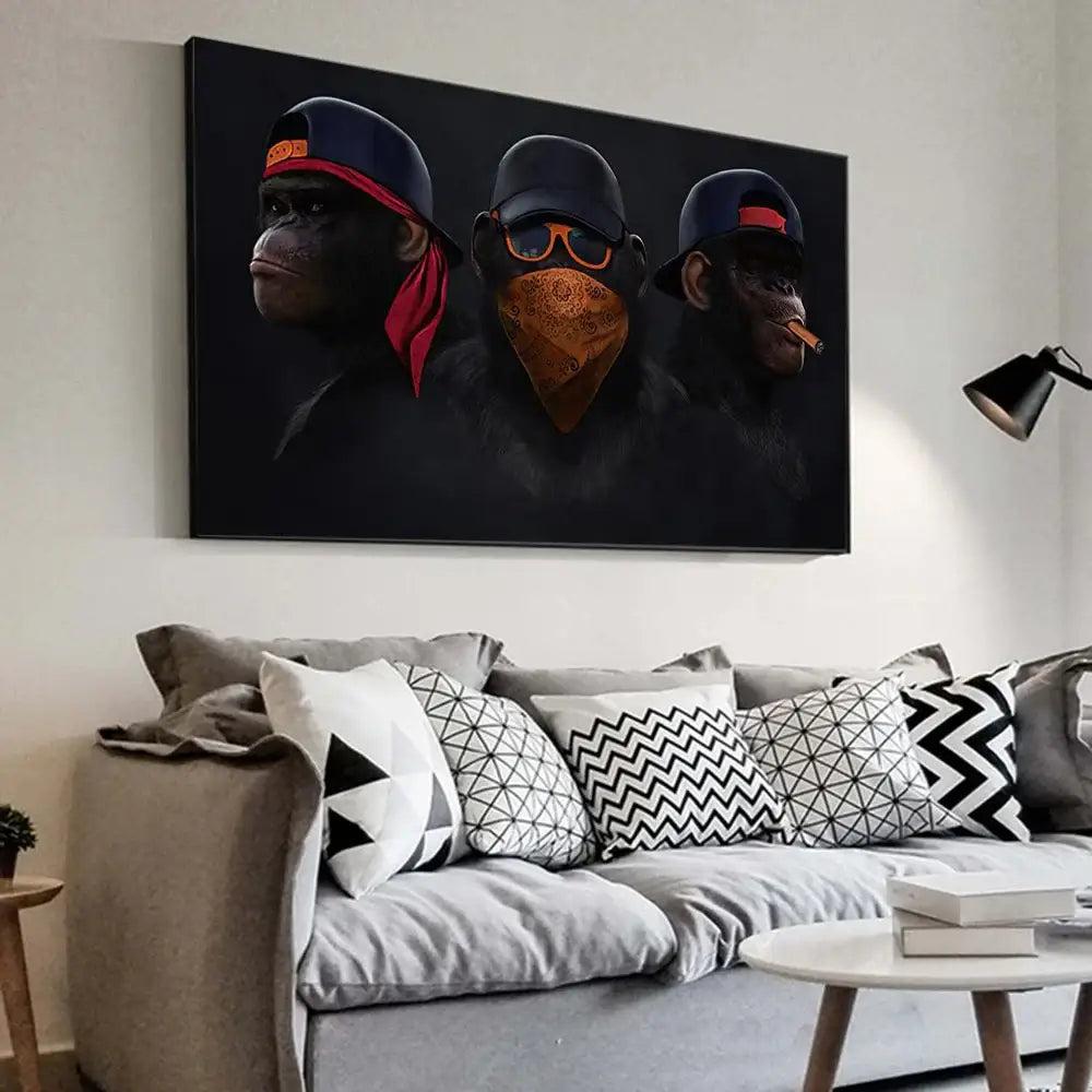 Black canvas monkey wall art featuring three hip-hop style monkeys with caps and bandanas smoking a cigar