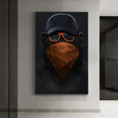 A framed canvas print of DecorBites™ monkey wall art featuring a black monkey with orange bandana and navy cap