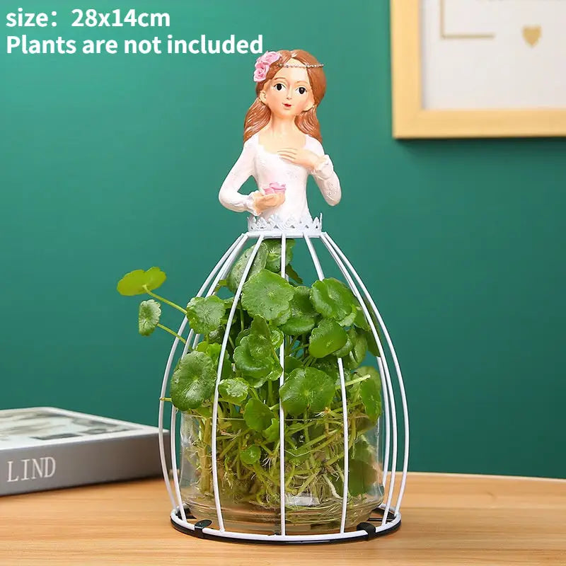 Decorbites™ flamingo metal vase with white resin figurine and wire cage base for home decor with green plants