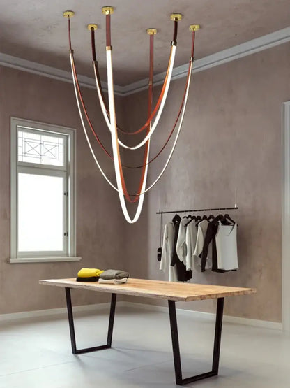 DecorBites flexible leather belt LED chandelier with curved illuminated strips in brown and white for living room
