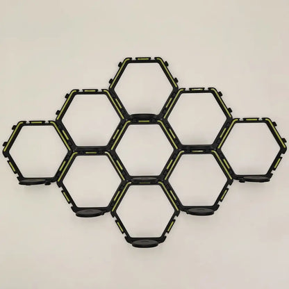 Black hexagonal floating display shelf with lime green accents by decorbites for collectible toys display shelf