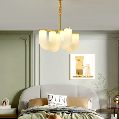 Gold-toned floor lamp with frosted glass shades shaped like overlapping petals from decorbites french cream collection