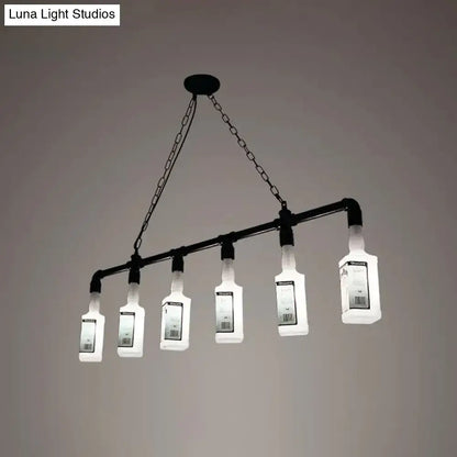 Black industrial chandelier featuring frosted white glass wine bottles suspended from a metal pipe frame for restaurants