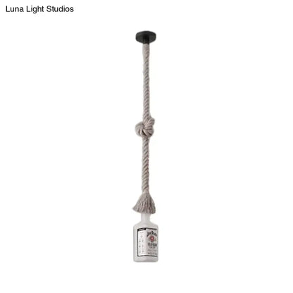DecorBites frosted white glass pendant light shaped like a black wine bottle with beige rope suspension for restaurants