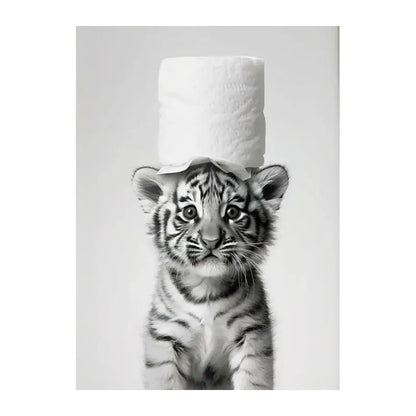 Black-and-white wall art of a white tiger cub balancing toilet paper for funny animals bathroom home decor