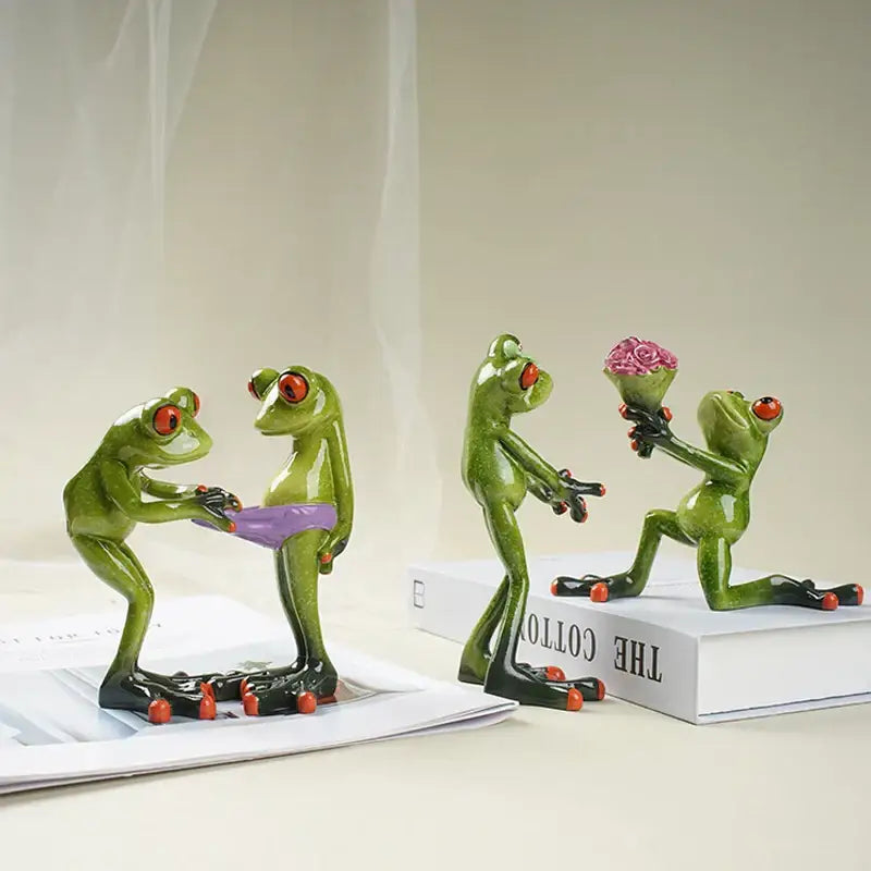 Green resin frog couple figurine with red eyes holding a purple bikini and pink rose bouquet decorbites funny frog