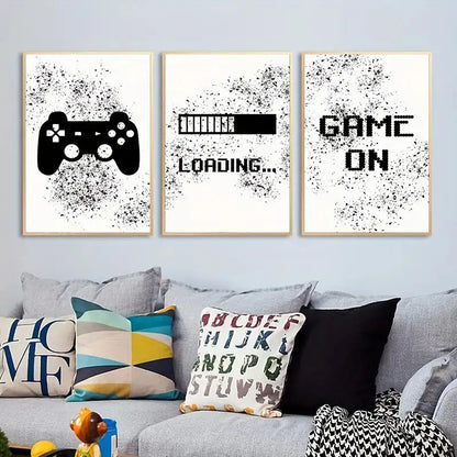 Set of three framed graffiti gamepad canvas prints with black splatter on white for gamer room decor by decorbites