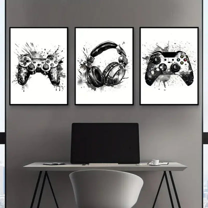 Three black-and-white graffiti gamepad canvas prints with splatter paint effects for gamer room decor above a desk