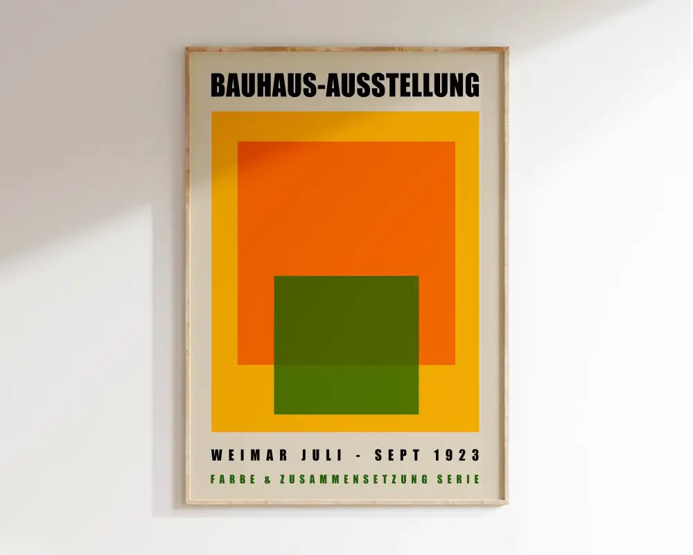 A framed decorbites™ canvas poster with modernist bauhaus geometric shapes in orange green and yellow on a cream background