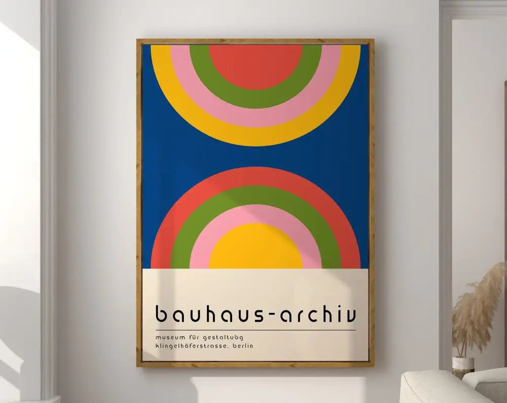A framed decorbites™ geometric bauhaus canvas poster with bold concentric rainbow arcs on deep blue background