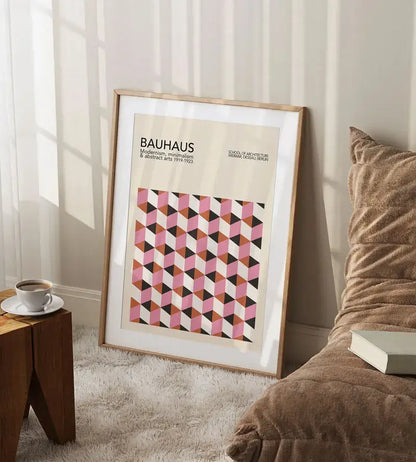 A framed decorbites™ geometric bauhaus canvas poster with pink black and beige tones for modern retro wall art