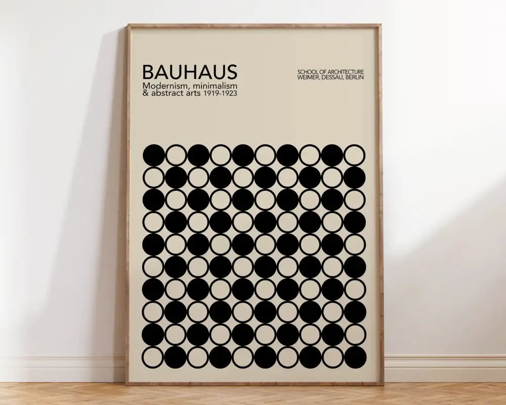 Beige geometric bauhaus canvas poster with black circular patterns in a light wood frame for stylish home decor