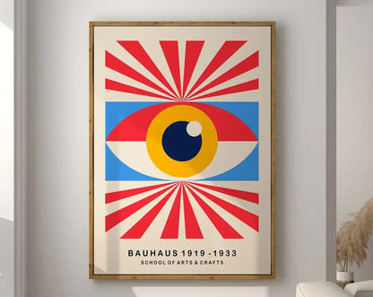 A framed decorbites™ geometric bauhaus canvas print with a bold eye design in red blue and yellow for home decor