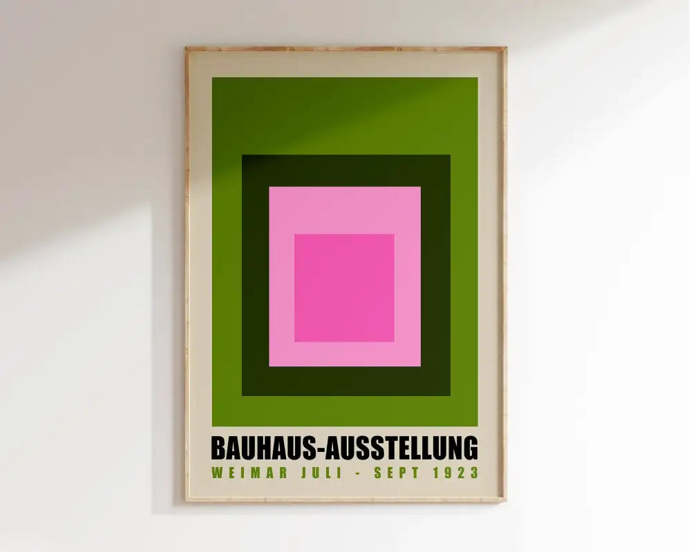 A framed decorbites™ geometric canvas poster featuring vibrant pink and green concentric squares with black text at bottom